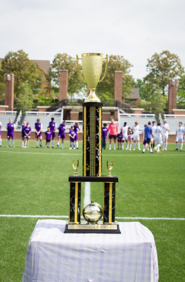 The Robert H. Brooks Sports Science Institute sponsored the match's trophy, which the Clemson CP team raised following its win.